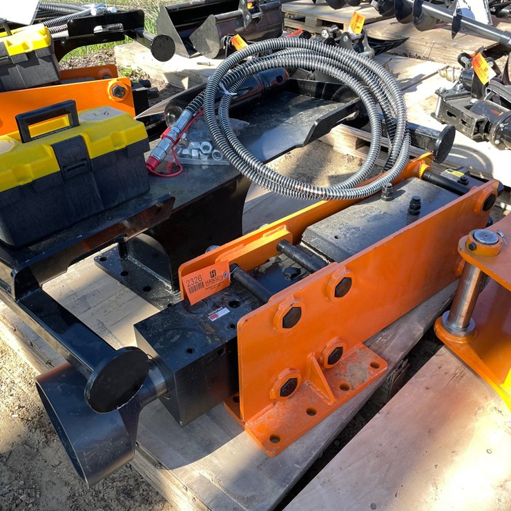 #2326 • New Wolverine Skid Steer Post Driver Attachment