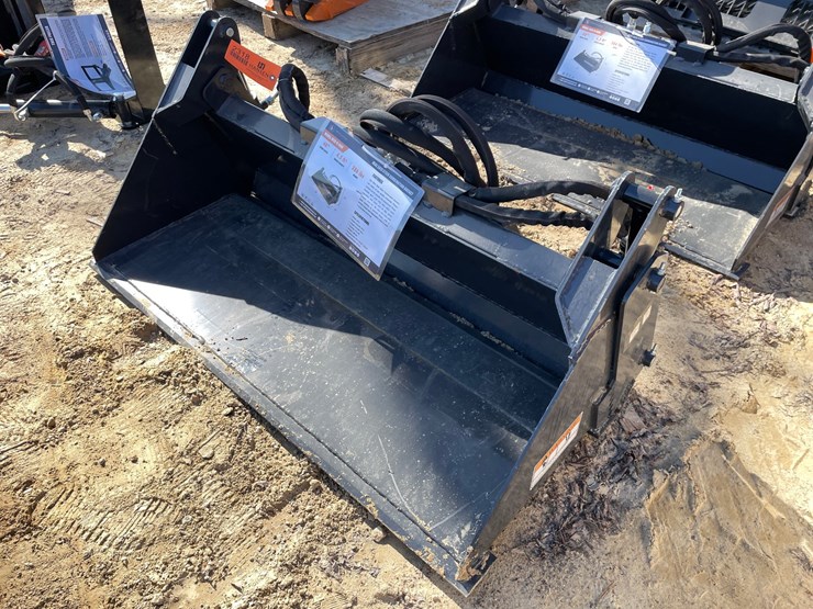 #2318-•-new-wolverine-mini-skid-steer-combination-bucket-image-1