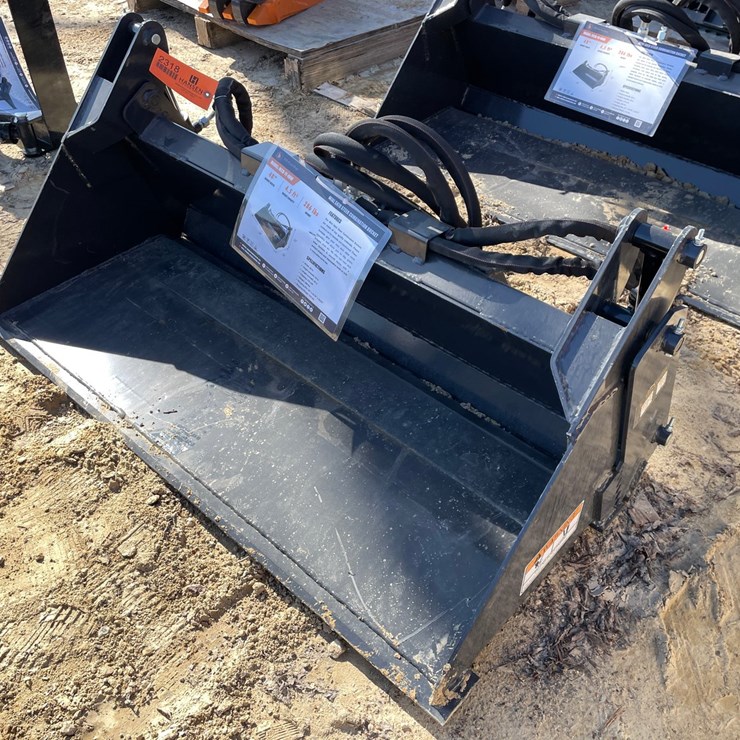 #2318 • New Wolverine Mini Skid Steer Combination Bucket