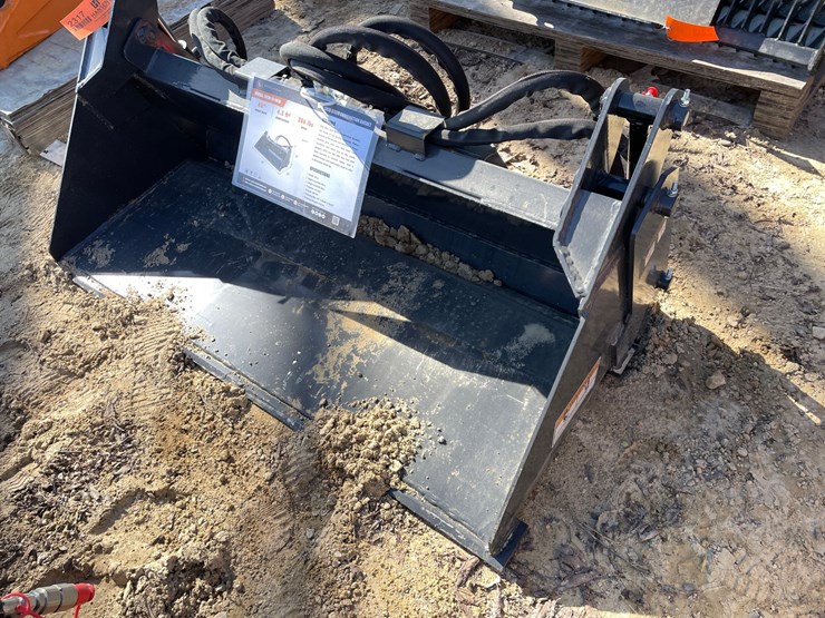 #2317-•-new-wolverine-mini-skid-steer-combination-bucket-image-1