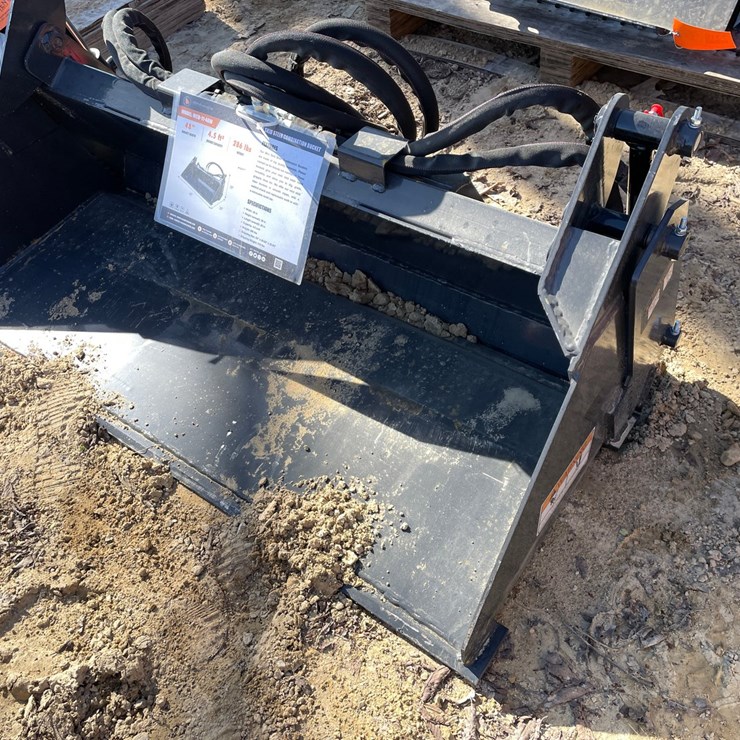 #2317 • New Wolverine Mini Skid Steer Combination Bucket