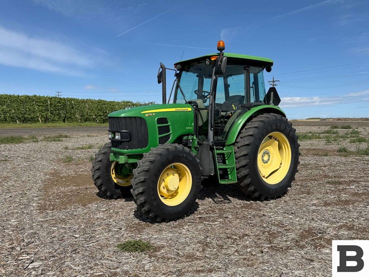 2009-john-deere-6115d-image-1