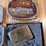 collection-of-four-assorted-metal-belt-buckles-including-snap-on-and-adm-transportation-image-4