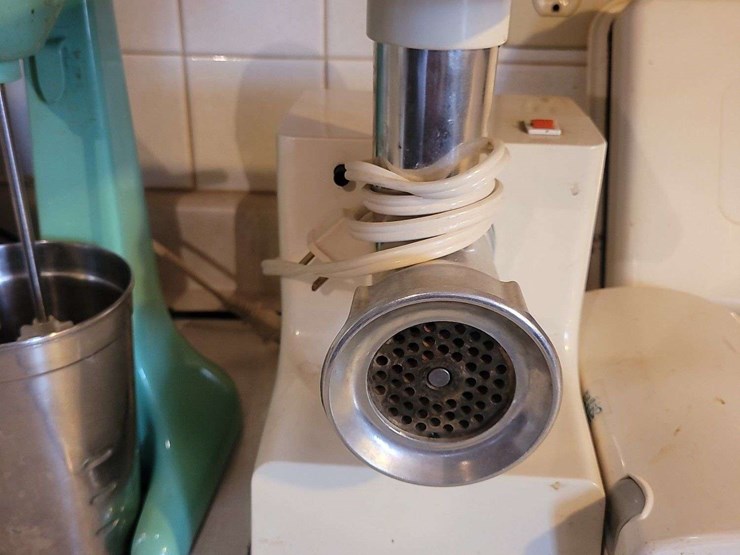 collection-of-kitchen-appliances-including-ronco-rotisserie,-hamilton-beach-mixer,-meat-grinder,-and-rival-slicer-image-4