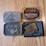 collection-of-four-assorted-metal-belt-buckles-including-snap-on-and-adm-transportation-image-1