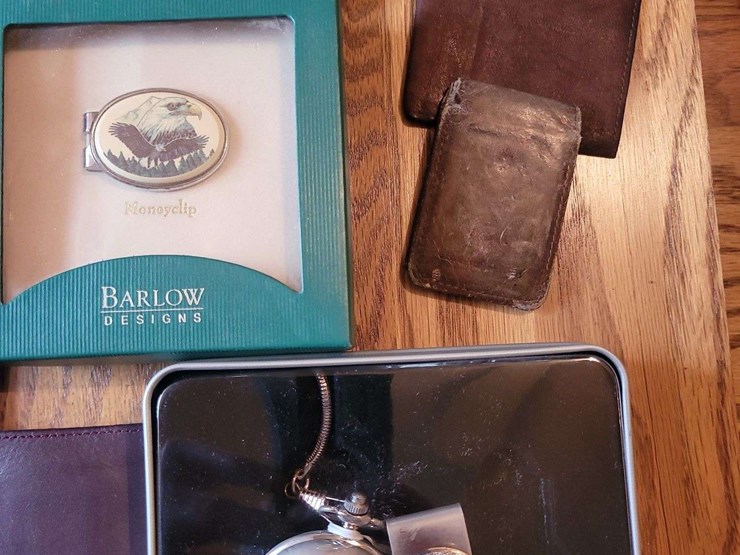 collection-of-assorted-wristwatches,-leather-wallets,-and-money-clips-image-14