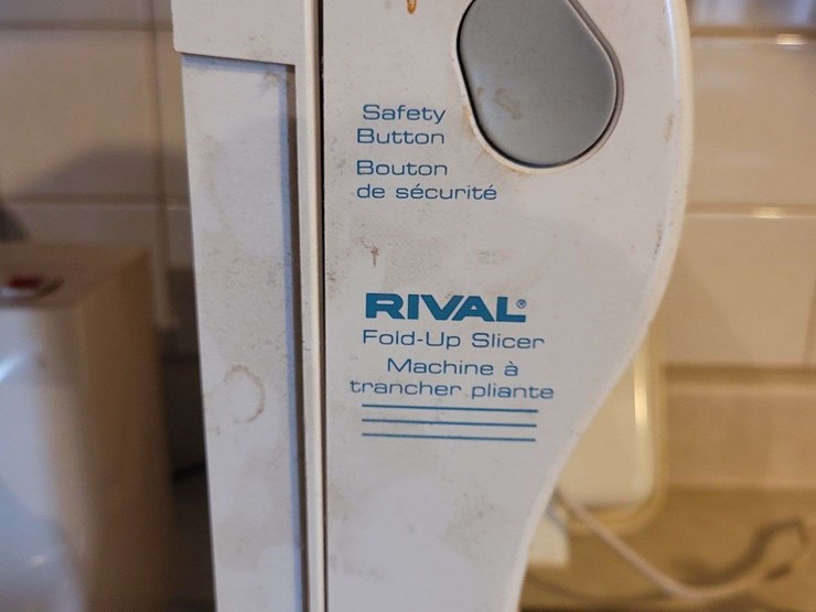 collection-of-kitchen-appliances-including-ronco-rotisserie,-hamilton-beach-mixer,-meat-grinder,-and-rival-slicer-image-6