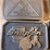collection-of-four-assorted-metal-belt-buckles-including-snap-on-and-adm-transportation-image-2