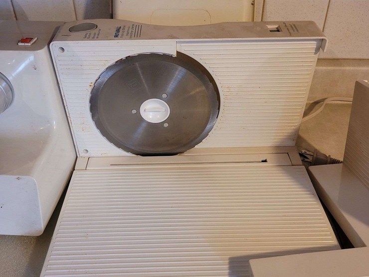 collection-of-kitchen-appliances-including-ronco-rotisserie,-hamilton-beach-mixer,-meat-grinder,-and-rival-slicer-image-5