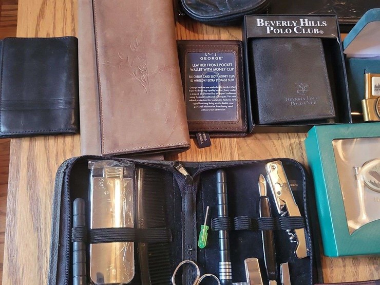 collection-of-assorted-wristwatches,-leather-wallets,-and-money-clips-image-11