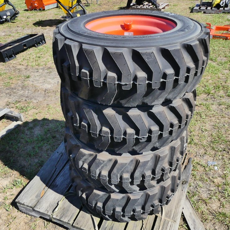 (4) 10-16.5 Titan Tires