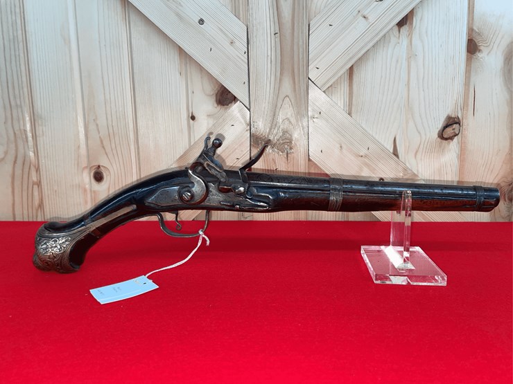 flintlock-pistol-with-ornate-brass-furniture-image-1