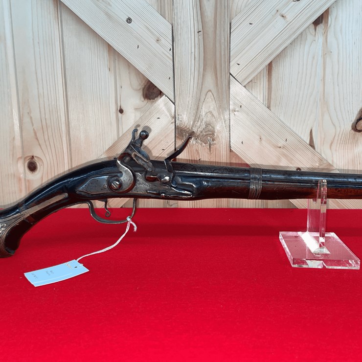Flintlock Pistol with Ornate Brass Furniture