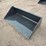 unused-2025-wolverine-tdb-11-66w-skid-steer-track-duty-bucket-attachment-image-1