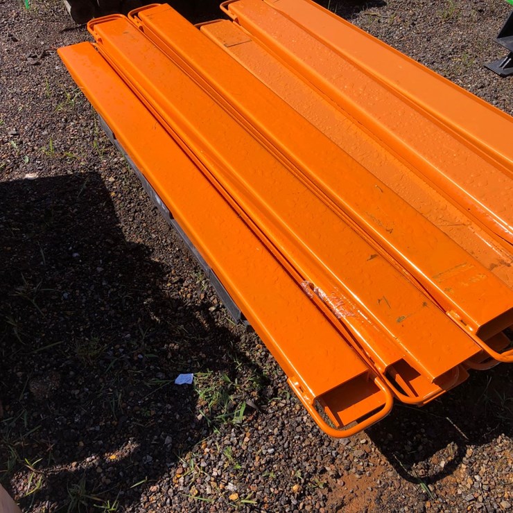 #63 • (1) SET 7’ PALLET FORK EXTENSIONS