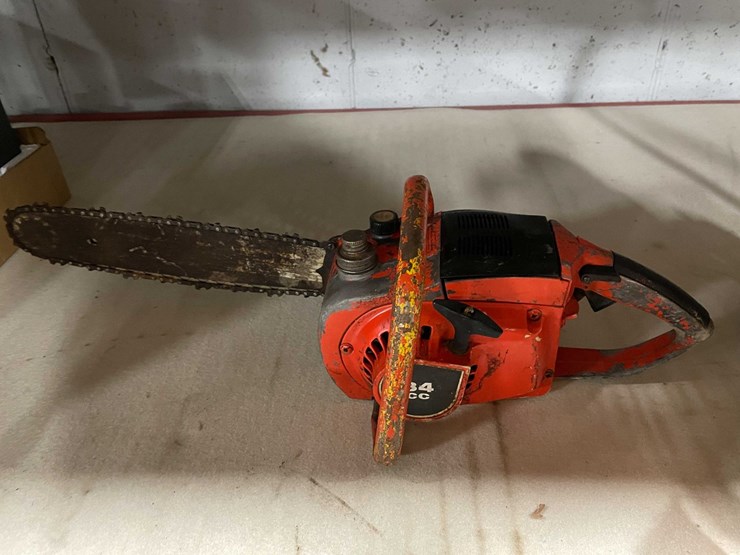 #2585-•-(2)-vintage-chainsaws-and-ice-auger-motor-(cw)-image-2
