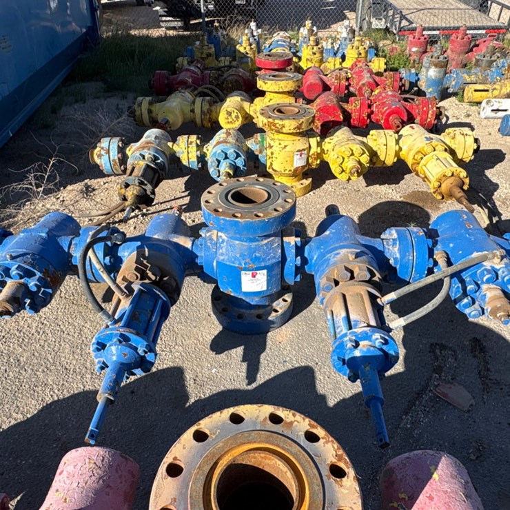 7-1/16” x 4” fluid cross w/ (4) 4” 10k gate valves