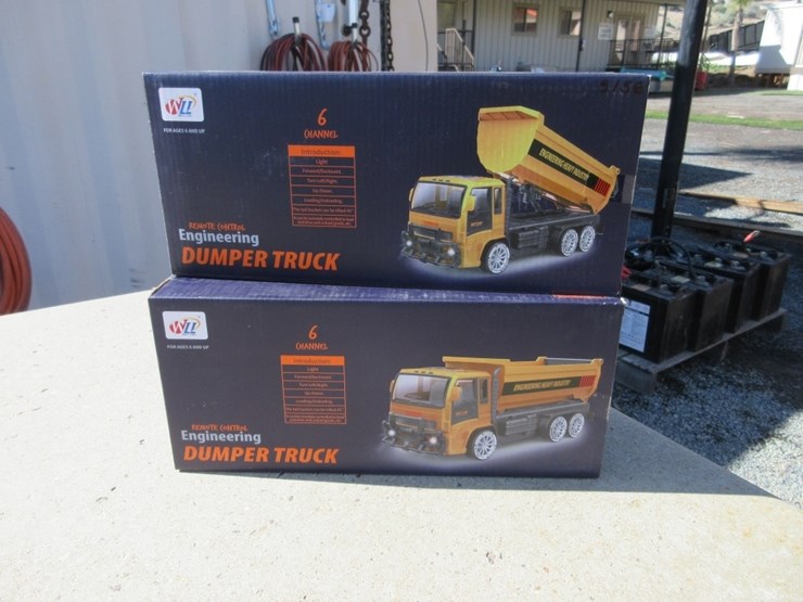 (2)-new-unused-remote-control-toy-dump-trucks,-image-1