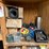 2-shelves-of-assorted-truck-parts,-tire-chains,-hand-tools,-etc-image-2