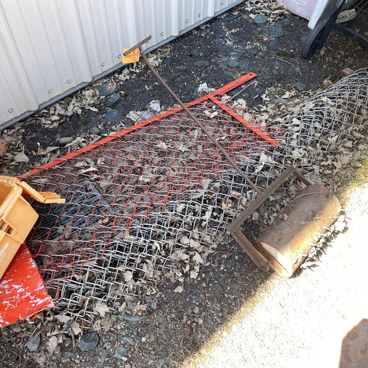 #1885 • Manual Lawn Aerator and Partial Roll of Chain Link Fence