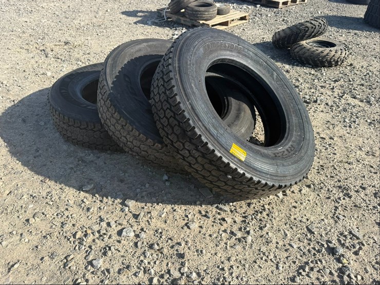 #701-•-lot-of-(3)-295/75r22.5-tires-inv#-40619-image-1