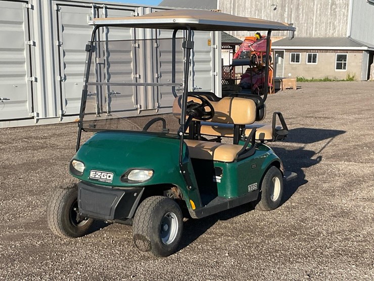 #2352-•-ezgo-shuttle-2+2-txt-4-passenger-golf-cart*-image-1