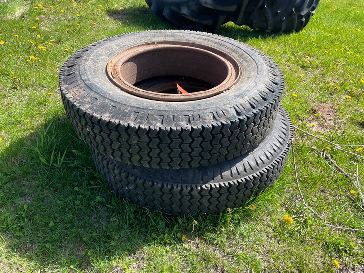#5594-•-(2)-industrial-tires-with-rims-image-1