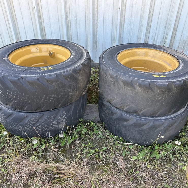 #52 • SKID STEER TIRES & WHEELS