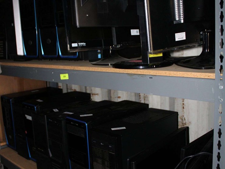 three-shelves-of-desktop-computers-&-flat-screen-monitors-image-1