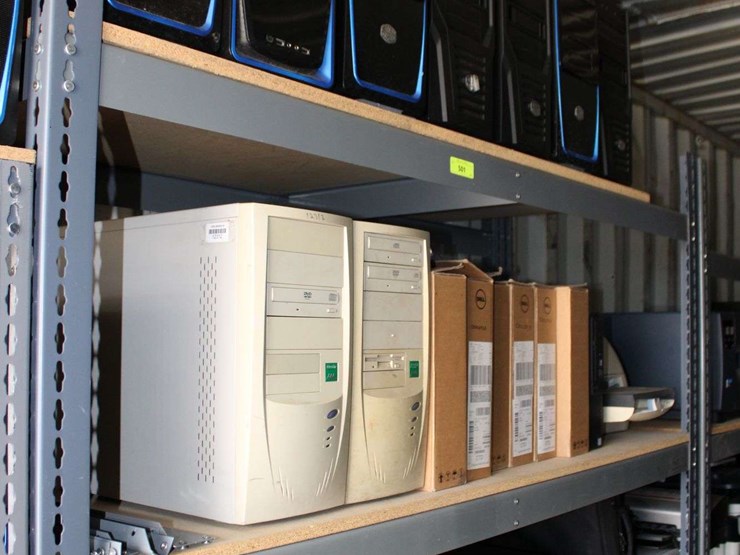 four-shelves-of-desktop-computers,-dell-laptops,-printers-image-1