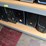 four-shelves-of-desktop-computers-image-7