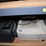 three-shelves-of-desktop-computers,-printers,-&-flat-screen-monitors-image-8