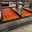 10-sections-of-orange-metal-floor-grates-image-8