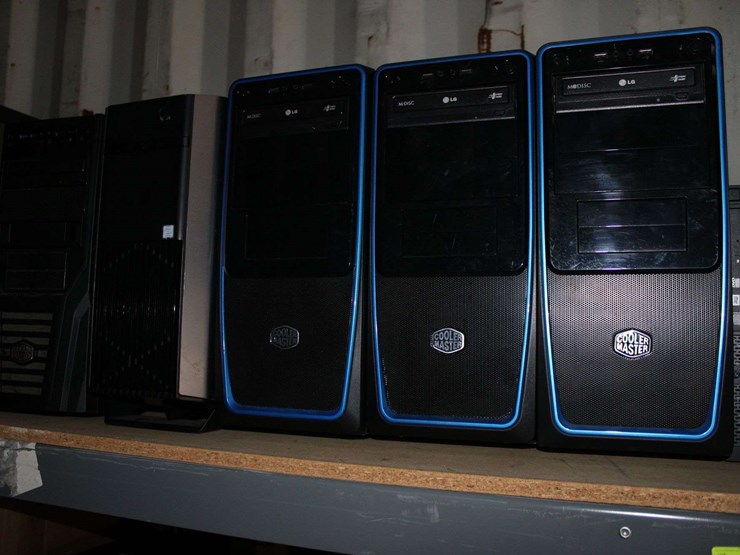 three-shelves-of-desktop-computers-&-flat-screen-monitors-image-3