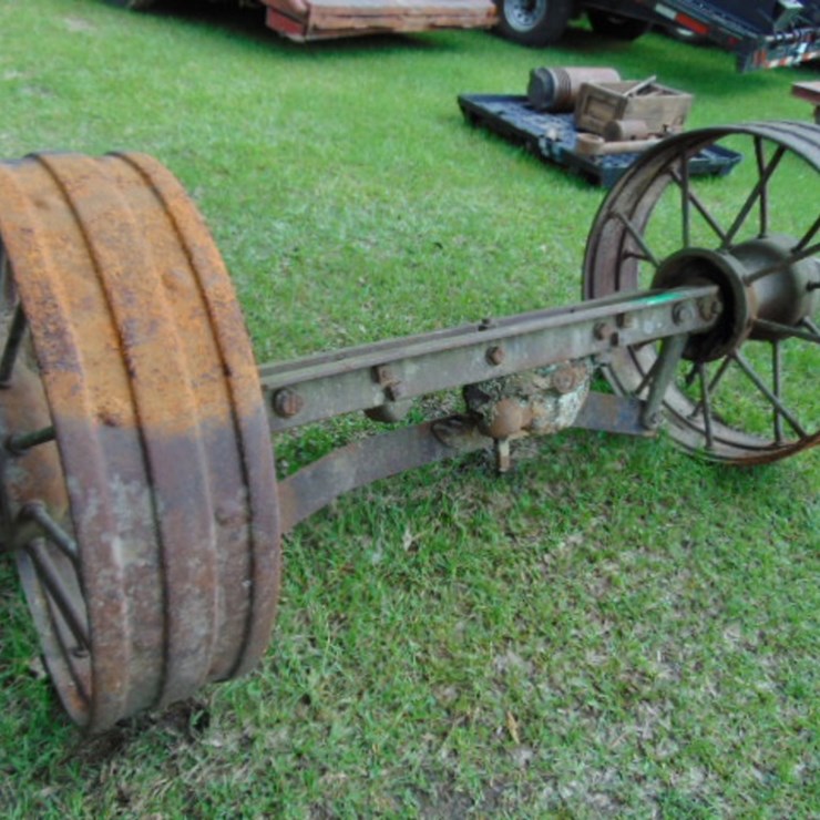 10" X 36" STEEL WHEEL ON 77" STEERING AXLE