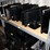 three-shelves-of-flat-screen-monitors-&-one-lg-flat-screen-tv-image-2