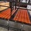 10-sections-of-orange-metal-floor-grates-image-7
