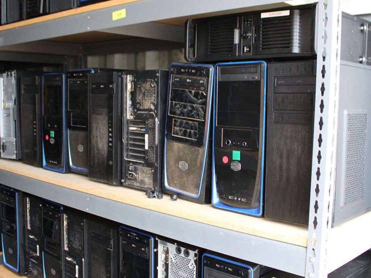 four-shelves-of-desktop-computers-image-1