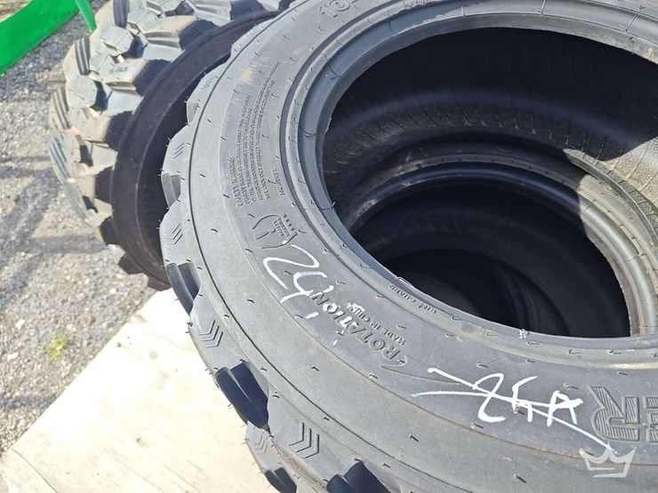 set-of-4-unused-10-16.5n.h.s.-forerunner-skid-steer-tires-image-4
