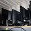 two-shelves-(top/-bottom-shelf)-of-flat-screen-monitors-&-laptops,-desktop-computers,-fax-machine-&-image-1