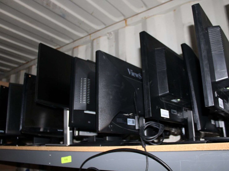 two-shelves-(top/-bottom-shelf)-of-flat-screen-monitors-&-laptops,-desktop-computers,-fax-machine-&-image-1