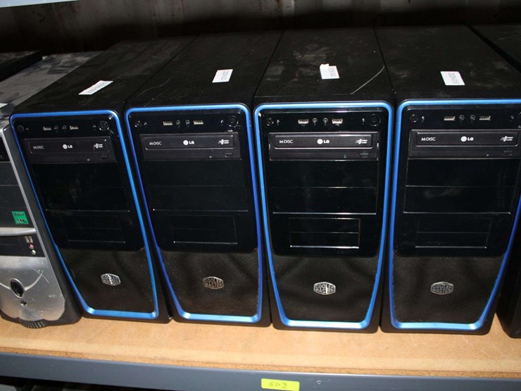 three-shelves-of-desktop-computers,-printers,-&-flat-screen-monitors-image-5