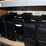 three-shelves-of-desktop-computers-&-flat-screen-monitors-image-4