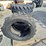 set-of-4-unused-10-16.5n.h.s.-forerunner-skid-steer-tires-image-1