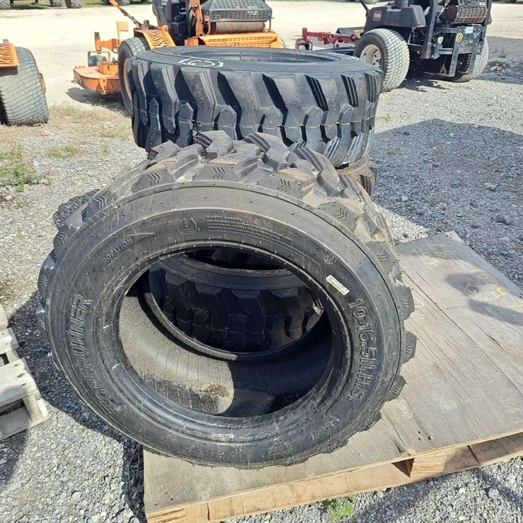 Set of 4 Unused 10-16.5N.H.S. ForeRunner Skid Steer Tires