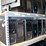 four-shelves-of-desktop-computers-&-flatscreen-monitors-(cooler-master-computers)-image-1