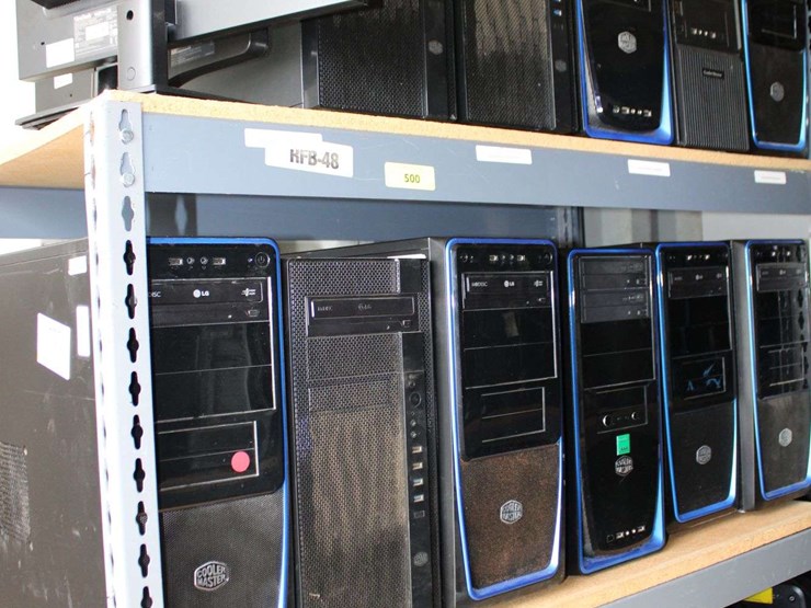 four-shelves-of-desktop-computers-&-flatscreen-monitors-(cooler-master-computers)-image-1