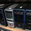 three-shelves-of-desktop-computers,-printers,-&-flat-screen-monitors-image-4