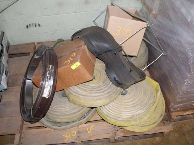pallet-of-firehoses-and-a-roll-of-strapping,-and-more-metal-image-1