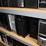 four-shelves-of-desktop-computers-&-laptop-computers-image-5